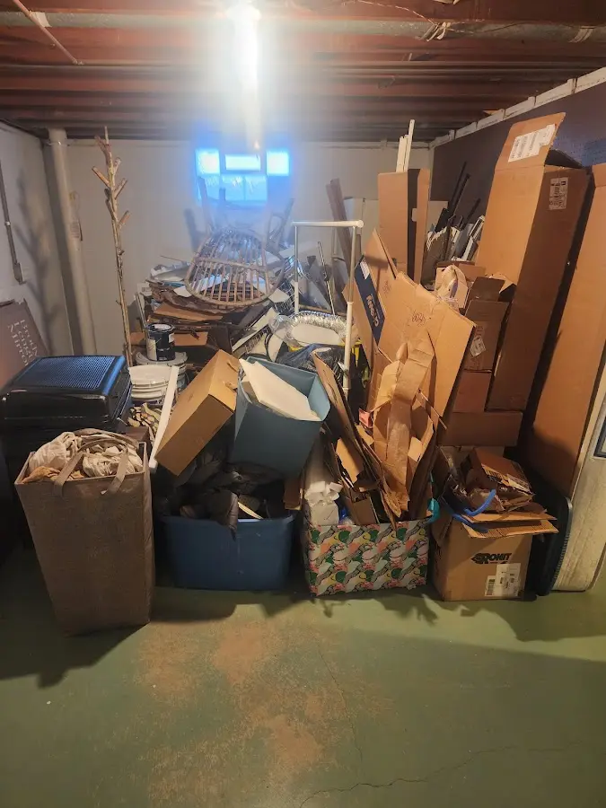 Roll-off dumpster container at job site for 2 Yard Dumpster Rental in Maywood